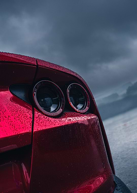Red Car Tail Lights in Rain