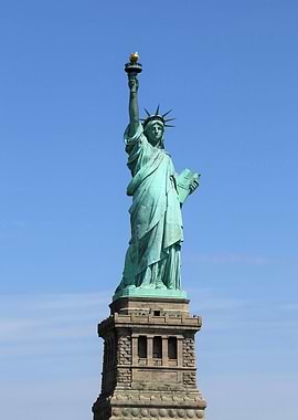 Statue of Liberty against blue sky