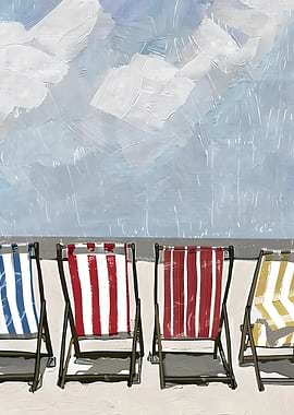 Beach chairs under a cloudy sky
