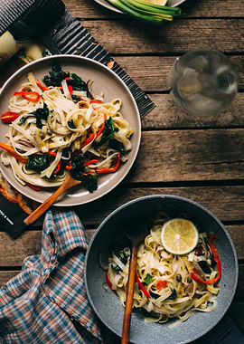Pasta dishes on wooden table