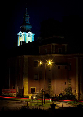 Nighttime view of a building with clocktower