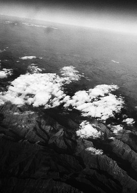 Aerial View of Mountains and Clouds