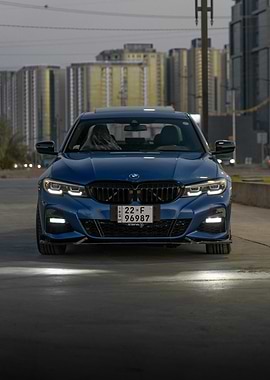 Blue BMW in Urban Setting