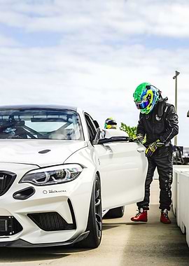 Race Car Driver and White Sports Car