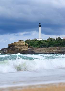 Biarritz Lighthouse on Cliff with Ocean Waves