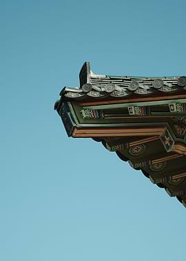 Korean Architecture Detail Against Blue Sky