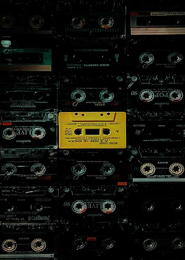 Cassette Tape Collection with Yellow Highlight