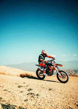 Motocross Rider on Dirt Track