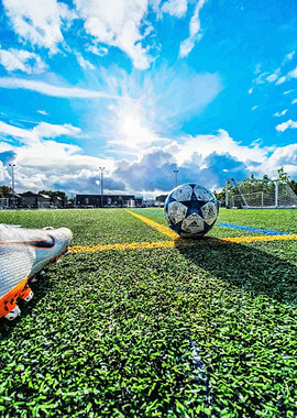 Soccer ball on a green field