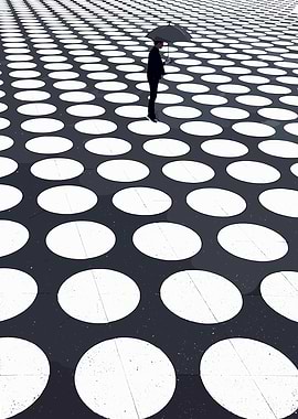 Man with Umbrella on Dotted Surface