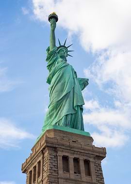 Statue of Liberty against blue sky