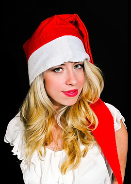 Beautiful blonde Woman in Santa Hat Portrait