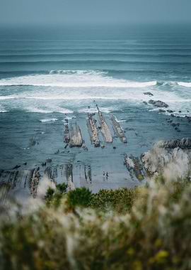 Flysch Cliffs and Ocean Waves
