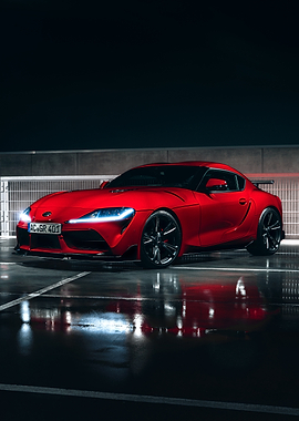 Red Toyota Supra on Wet Asphalt
