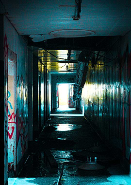 Abandoned Hallway with Graffiti and Debris