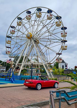 Miata and Ferris Wheel in an amusement park
