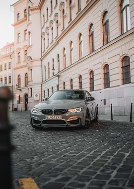 BMW M3 on Cobblestone Street