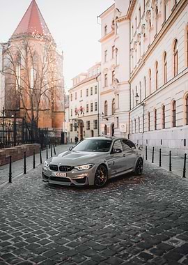 BMW M3 on Cobblestone Street
