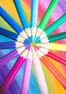 Colorful Pencils on Rainbow Background