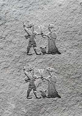 Ancient Stone Carving of Figures