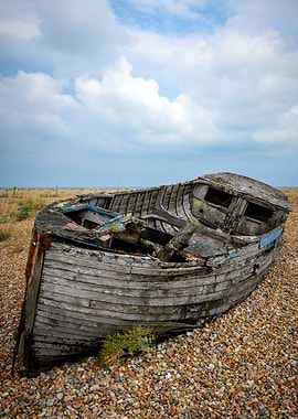 Abandoned Boat on Pebble Beach