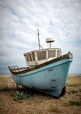Abandoned Boat on Beach