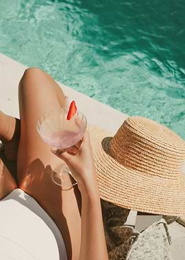Poolside Relaxation with Cocktail and Hat