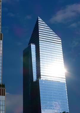 Modern Skyscraper Against Blue Sky