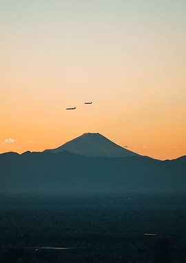 Mount Fuji with Airplanes at Sunset