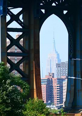 Empire State Building through bridge arch