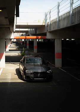 Dark Audi RS3 in Parking Garage