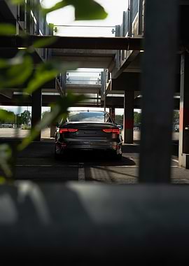Gray Audi RS3 in Parking Garage