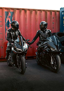 Two Motorcyclists with Black Sport Bikes