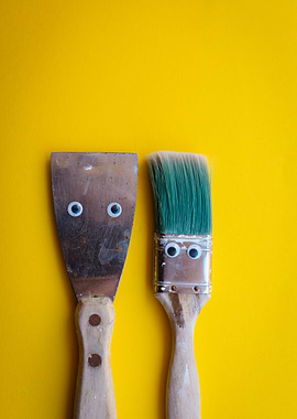 Googly-Eyed Paint Tools on Yellow Background