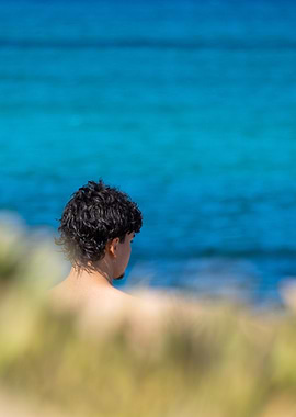 Man Gazing at the Ocean