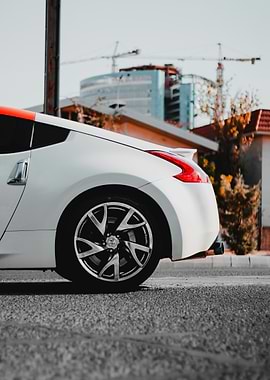 White Sports Car on Asphalt Road 370z Nissan