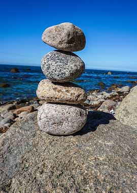 Rock Balancing by the Sea