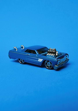 Blue Toy Car on Blue Background