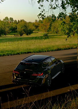 Black BMW M5 Touring on Road