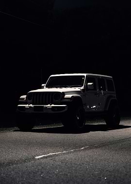 White Jeep Wrangler at Night