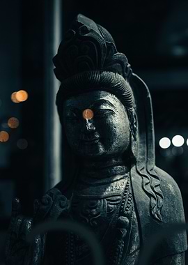 Stone Buddha Statue with Bokeh Lights
