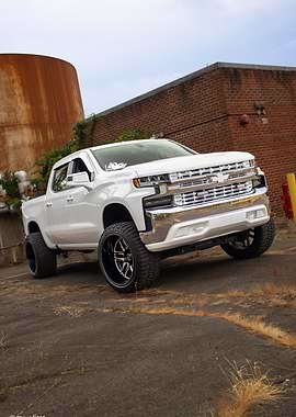 White Chevrolet Truck with Custom Wheels