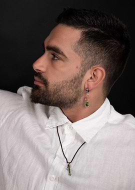 Man Wearing Jewelry in Studio Portrait