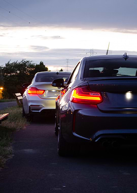 Two Cars Parked at Dusk