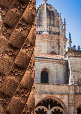 Architectural Detail: Carved Column and Building