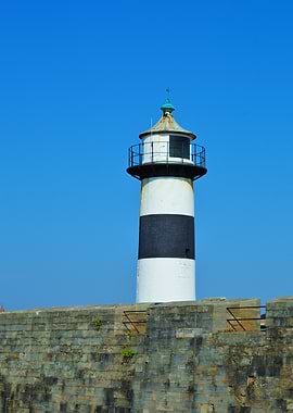 Southsea Castle Lighthouse against a clear blue sky