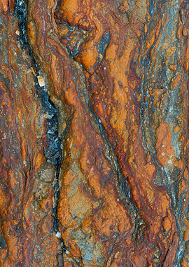 Textured Rock Surface with Orange and Gray