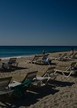 Beach scene with lounge chairs
