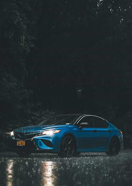 Blue Car in the Rain