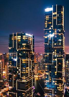 Night cityscape with illuminated skyscrapers
